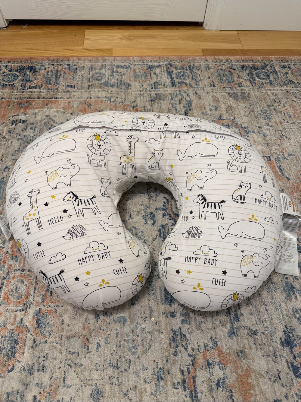 Boppy Nursing Pillow in White with Gray and Yellow Animal Print